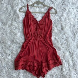 Romper with beautiful details and color